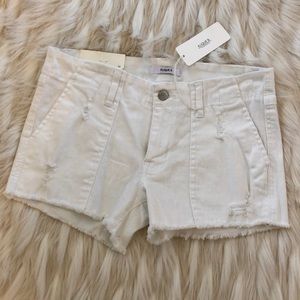 Kilque B. White cut off jean shorts